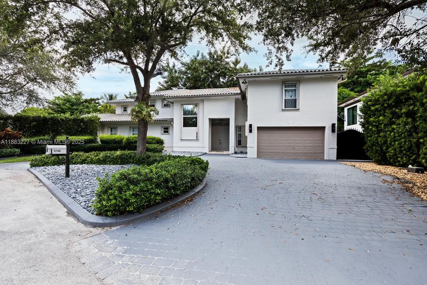 Located on a quiet cul-de-sac in S. Miami, this 2-story, 5/4.5 home offers spacious living & resort-style outdoor spaces. The all-white modern fully renovated kitchen, features top-of-the-line appliances & the open-concept living area flows seamlessly, including an enclosed impact-glass extra living room overlooking the pool. The backyard is perfect for entertaining, w/ a screened patio, full summer kitchen (gas range and refrigerator) & beautifully designed pool area. Additional highlights include: heated salt-water pool, smart home features (for all lights, garage door, pool, A/C), EV charging hookup, Bluetooth-enabled surround system/intercom, bidet toilet seats, & meticulous "like new" condition maintained by owner. Prime location near top schools, shopping, dining, the Gables & Grove.