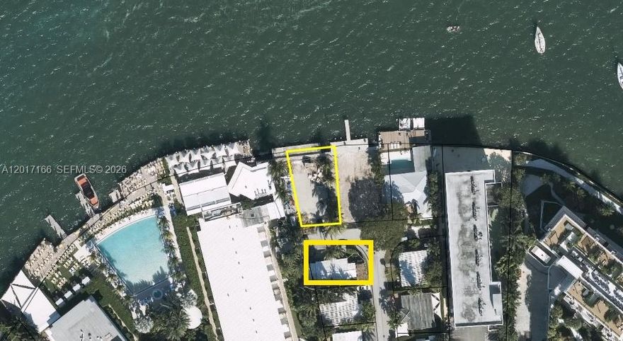 This combined property offers a rare opportunity to develop your vision and luxury home on Belle Isle's exclusive
Farrey Lane. Over 7,300 SF of land with open views to Biscayne Bay and city with 50 FT of waterfront and a large private dock. As per owner, approved plans to build a 9,125 SF luxury 3-story single-family home with a rooftop terrace & bay view. The property is in an amazing central location next door to The Standard Hotel, and just a short distance to Sunset Harbour, Lincoln Road, fine dining, shops, South Beach, downtown Miami, cultural & sport venues, and MIA airport. Exceptional opportunity to develop a luxury waterfront home in a highly sought-after location! Owners will not sell the Properties separately.