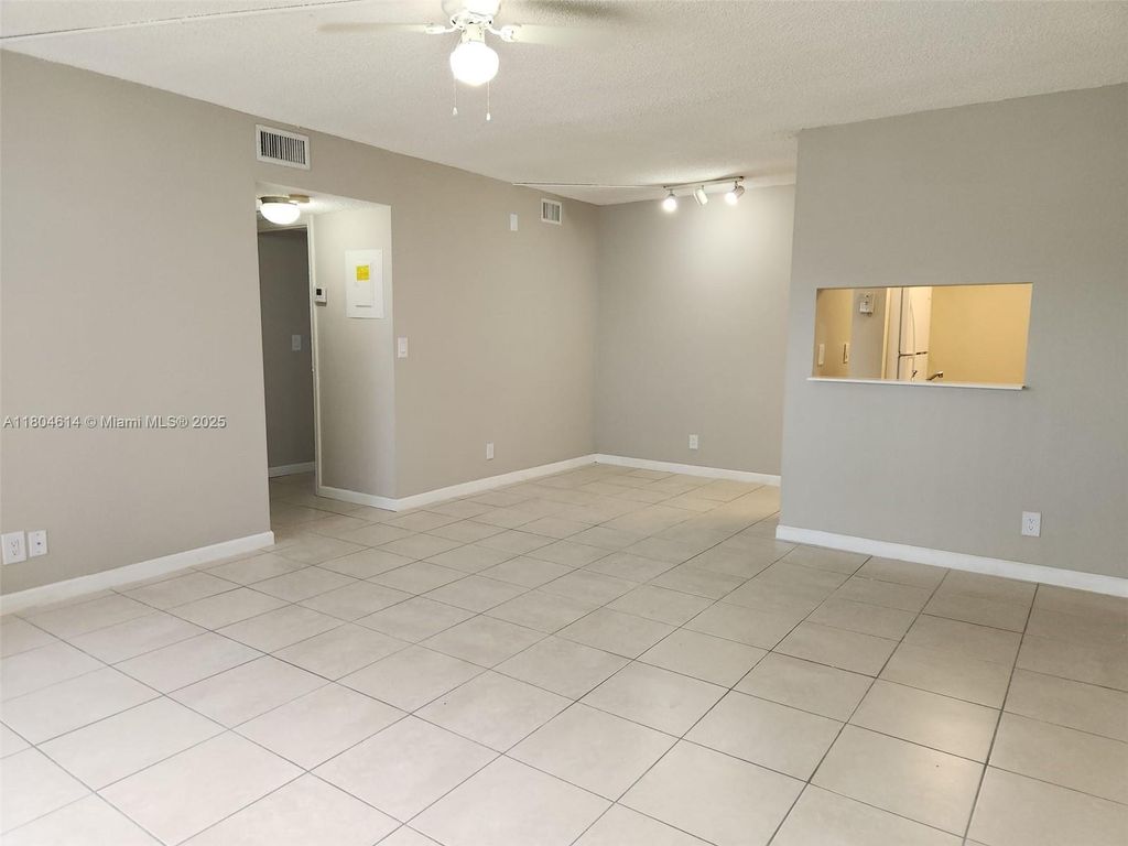 Photo of 3776 N University Dr #L-8, Coral Springs, FL 33065 (MLS # A11804614)