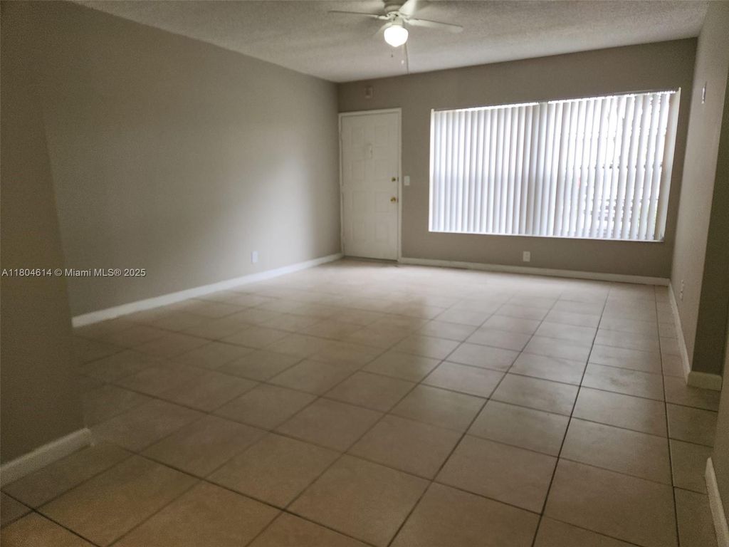 Photo of 3776 N University Dr #L-8, Coral Springs, FL 33065 (MLS # A11804614)