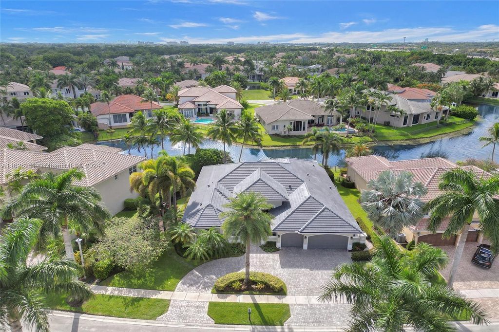 Photo of 710 Leigh Palm Ave, Plantation, FL 33324 (MLS # A11626251)