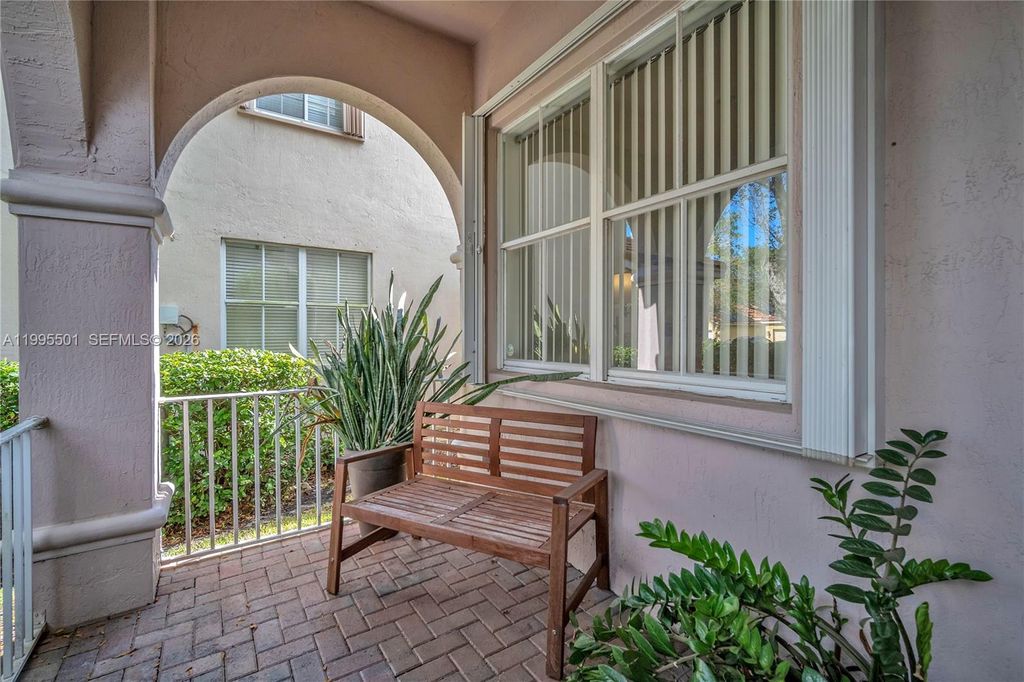 Photo of 1058 Tupelo Way, Weston, FL 33327 (MLS # A11995501)