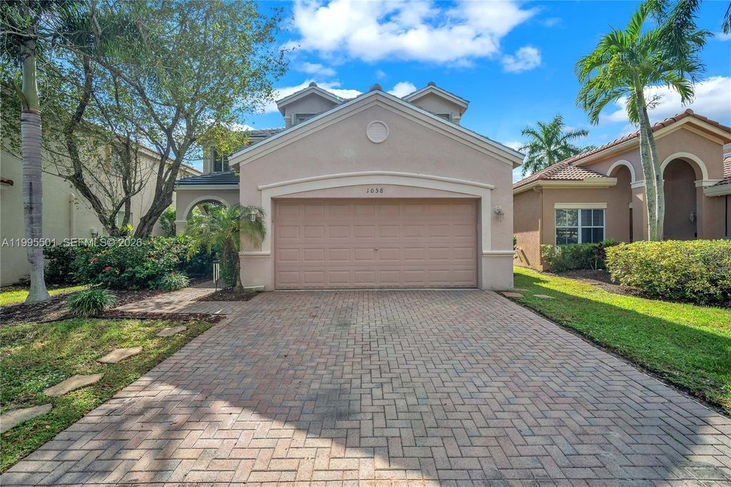 Photo of 1058 Tupelo Way, Weston, FL 33327 (MLS # A11995501)