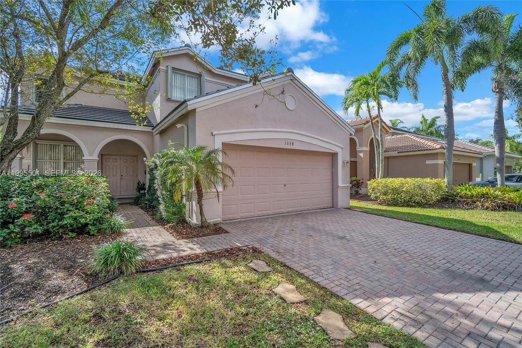 Photo of 1058 Tupelo Way, Weston, FL 33327 (MLS # A11995501)