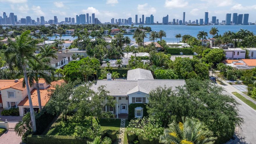 620 E Dilido Drive – an extraordinary find in one of Miami's most coveted neighborhood, the Venetian Islands. This designer home graces a corner double lot, spanning 15,000 square feet, making it the perfect family retreat. With over 6,000 square feet of interior space, this colonial masterpiece boasts 6 bedrooms and 5.5 bathrooms, radiating elegance and sophistication.
The living spaces are bathed in natural light, and floor-to-ceiling sliding doors seamlessly connect your chef's kitchen, complete with a large island to your lush garden, cabana, and pool area. The master suite boasts a spacious walk-in closet, an indulgent bathroom, and a comfortable sitting area.
Exquisite landscaping and a lush garden provide an unparalleled living space, setting this residence apart from the rest.