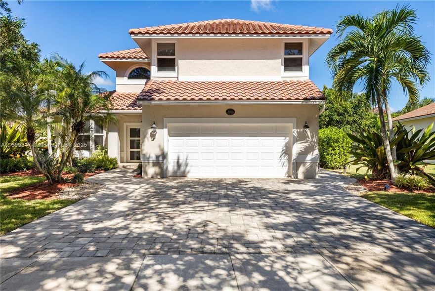 Beautifully updated 4-bed, 2.5-bath home in Embassy Lakes. With 2,886 sq ft on an oversized 10,794 sq ft corner lot, this home offers a bright, open layout with large windows & plantation shutters. The kitchen features granite countertops, stylish cabinetry, and new 2024 GE stainless steel appliances. Updates include a 2018 tankless water heater, 2014 roof, 2022 impact windows & doors, 2021 impact-rated garage door, and fresh exterior paint in 2024. Enjoy the saltwater pool surrounded by tropical landscaping. Embassy Lakes is a guard-gated community with a clubhouse, pool, gym, tennis, and basketball courts. Near top-rated Cooper City schools in the entire state of Florida assigned, Tree Tops Park, shopping, dining, & major highways. Move right in and enjoy the best of Cooper City living.
