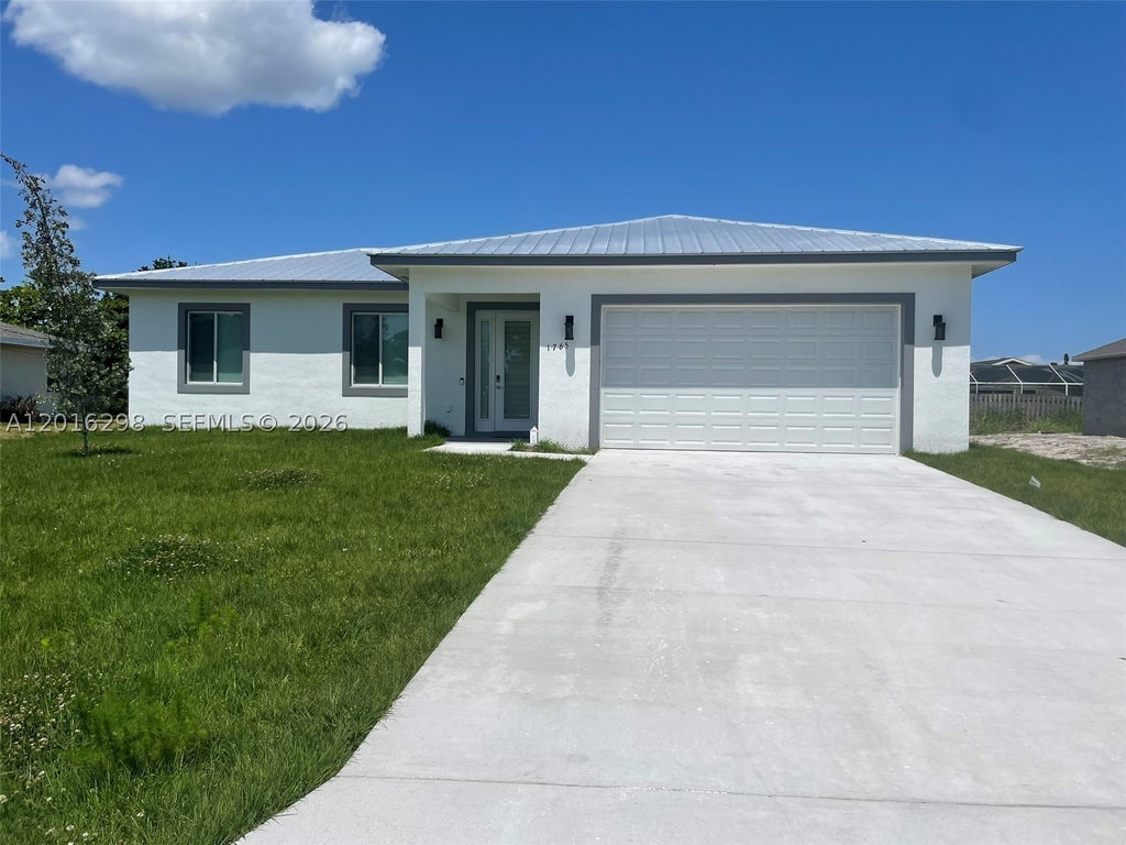 Photo of 1765 SE Aires Ln, Port St Lucie, FL 34984 (MLS # A12016298)