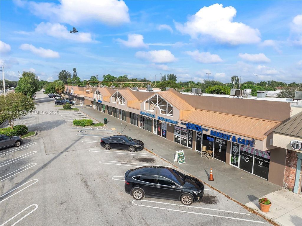 Photo of 7891-8021 W Sample Rd, Coral Springs, FL 33065 (MLS # A11957192)