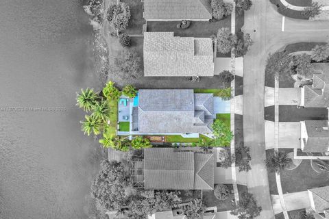 Photo of 214 SW 180th Ave, Pembroke Pines, FL 33029 (MLS # A11870823)