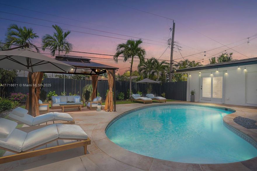 SELLER MOTIVATED!! Instant equity at closing — Appraised at $1.2M! Spacious 5-bedroom, 3-bathroom home with beautiful backyard. The kitchen boasts granite countertops and stainless steel appliances. The master suite has a walk-in closet and en-suite bath with a soaking tub and shower. Enjoy the fenced backyard with a patio & gazebo. Smart locking systems and security cameras add convenience and security. Located near shopping, dining, and entertainment, this home offers comfort and convenience. Don't miss out on this fantastic opportunity to own a Fort Lauderdale gem! Salt pool.
