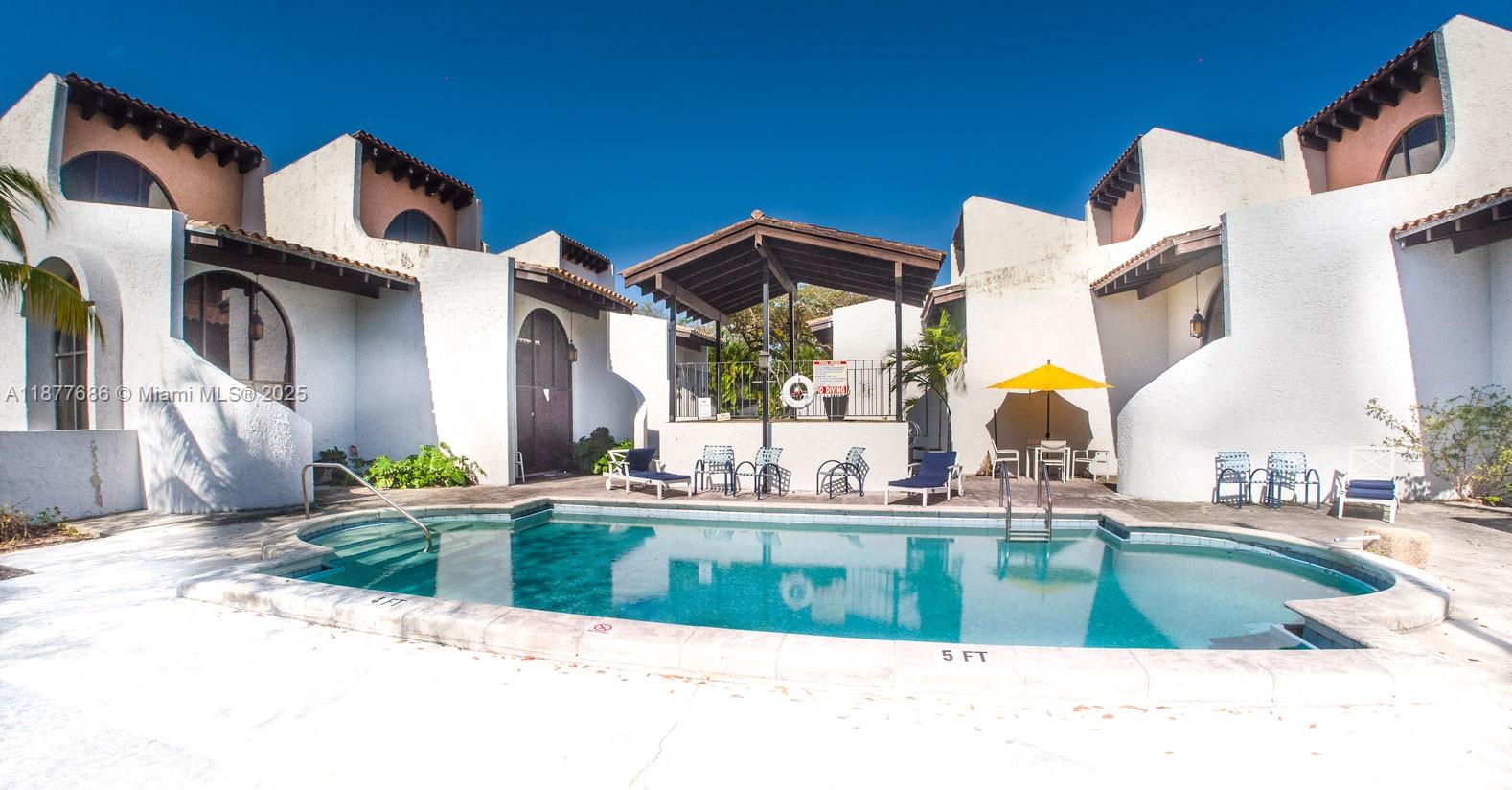 Come see this, rarely available, fabulous 1-bedroom 1- 1/2 bath, two-story Mediterranean Villa in the beautiful and historic Village of Miami Shores. This unique space features great natural light, high volume ceilings, large modern kitchen, and tons of closet space. Only 9 villas in this small, community with beautiful center courtyard featuring a pool, pool table, and outdoor grill for your enjoyment. The community is located on a tree lined street within walking distance to Publix supermarket, Starbucks, Chik-Fil-A, Miami Shores country club golf / tennis, fitness, restaurants and shopping. Only a short ten minute drive to the beach and I-95. Easy to Show, and rapid approval.