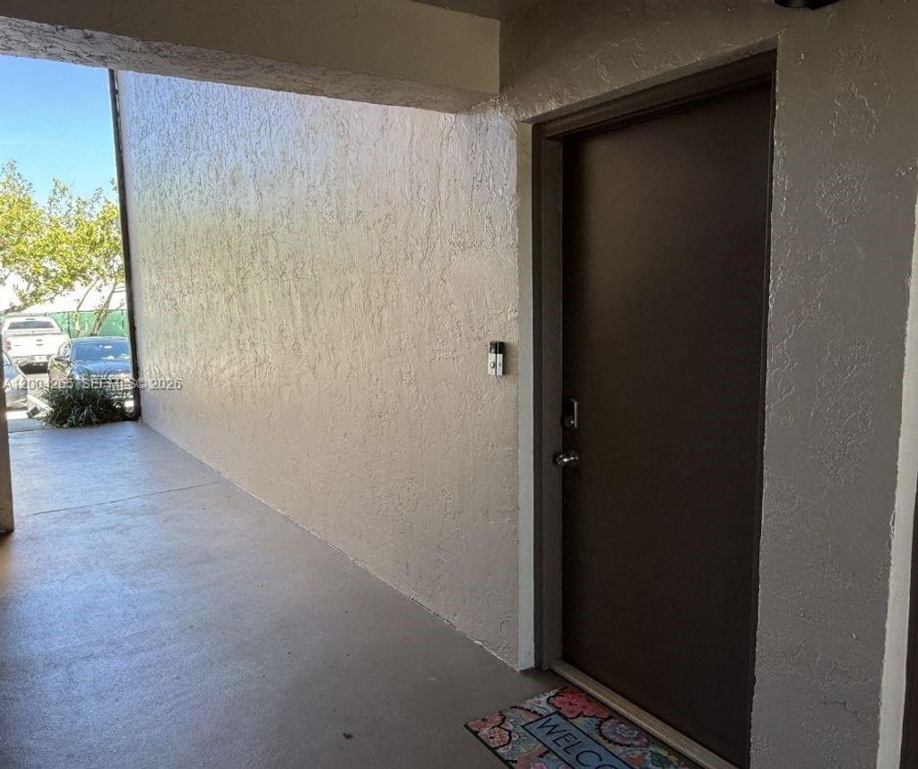 Photo of 5767 Washington St #F1, Hollywood, FL 33023 (MLS # A12004265)