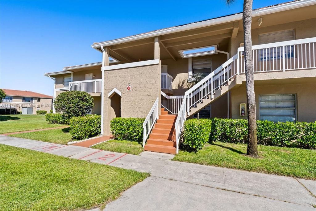 Photo of 869 Twin Lakes Dr #10-H, Coral Springs, FL 33071 (MLS # A11473638)