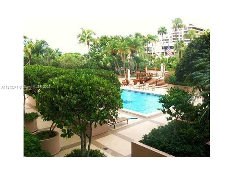 2 bedroom 2 bath, desirable split plan, in prestigious Key Colony. Large balcony facing North.  Furnished with great taste.