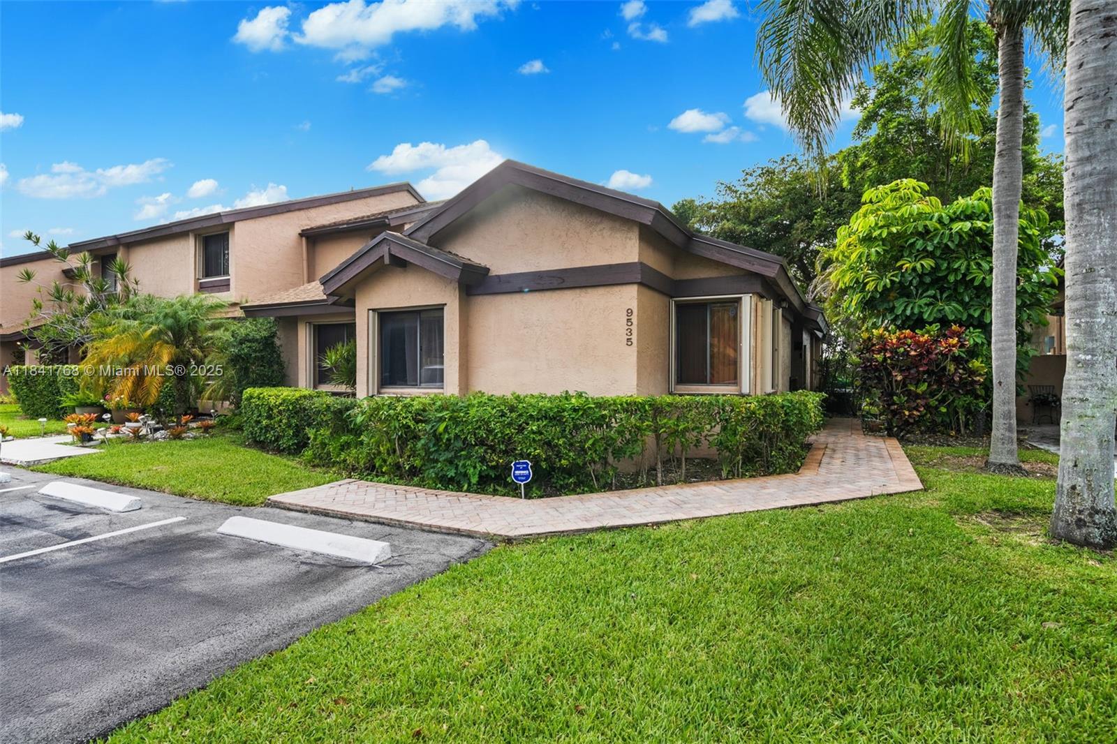 Nicely updated 3/2 villa in the Landings of Welleby. New roof 2025 and A/C replaced 2022. Updated kitchen with granite counters and SS appliances. Updated bathrooms with wood floors throughout. Beautiful large screened in patio on the widest part of the lake. (Screens replaced July of this year.) Home boasts accordion shutters on all windows. Community pool and 2 parking spots in front of the unit with ample guest parking across the way. Close to shopping, entertainment and highways. With the beautiful lake view, lovely upgrades and central Sunrise location, this is a great place to call home!