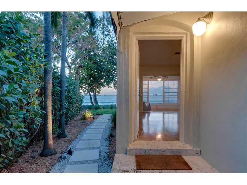 Unique opportunity to own one of five single family waterfront homes on Belle Isle. 8 Century Lane is tucked on the west side of the Standard Hotel with wide open views of Biscayne Bay. The open pie shape lot features a nice size yard and 55.5 linear feet  of waterfront. Great character, quaint and private with a fabulous location describe this true gem on the Venetian Islands. A true pleasure to show