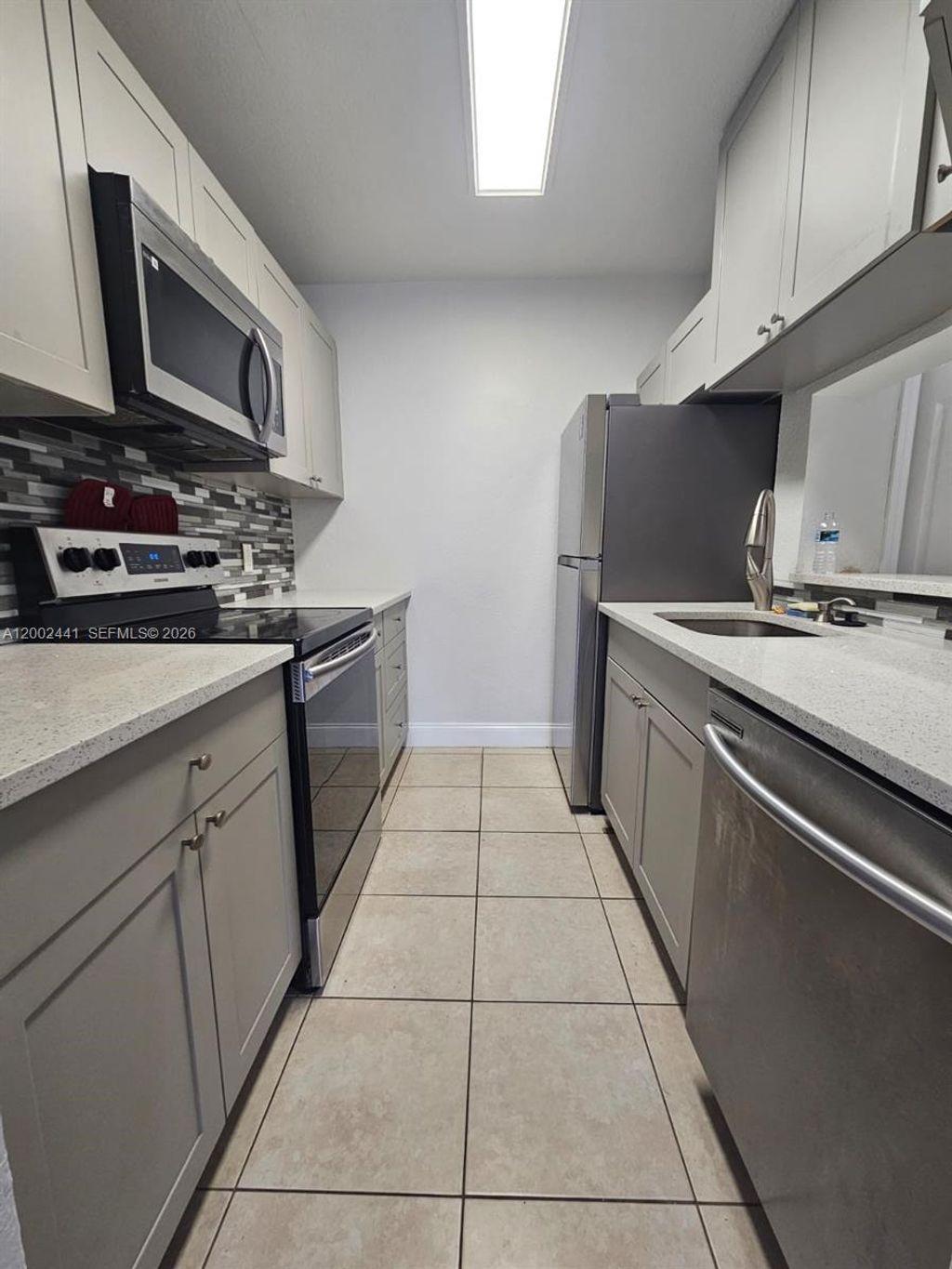 Photo of 4401 W Mcnab Rd #22, Pompano Beach, FL 33069 (MLS # A12002441)