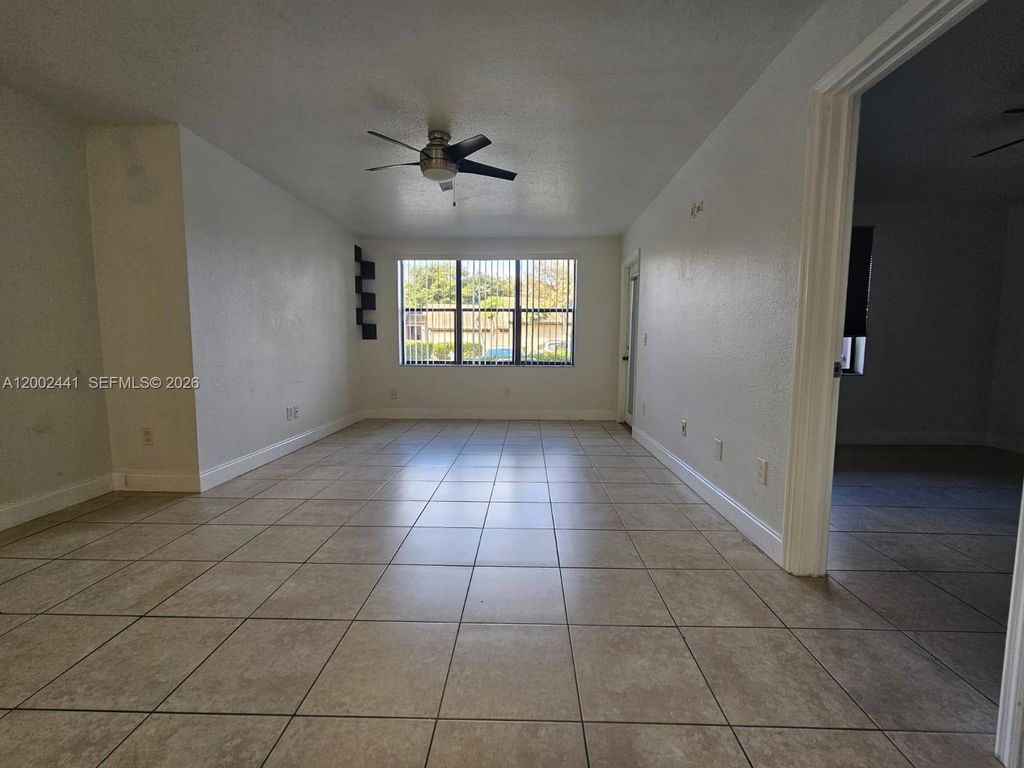 Photo of 4401 W Mcnab Rd #22, Pompano Beach, FL 33069 (MLS # A12002441)