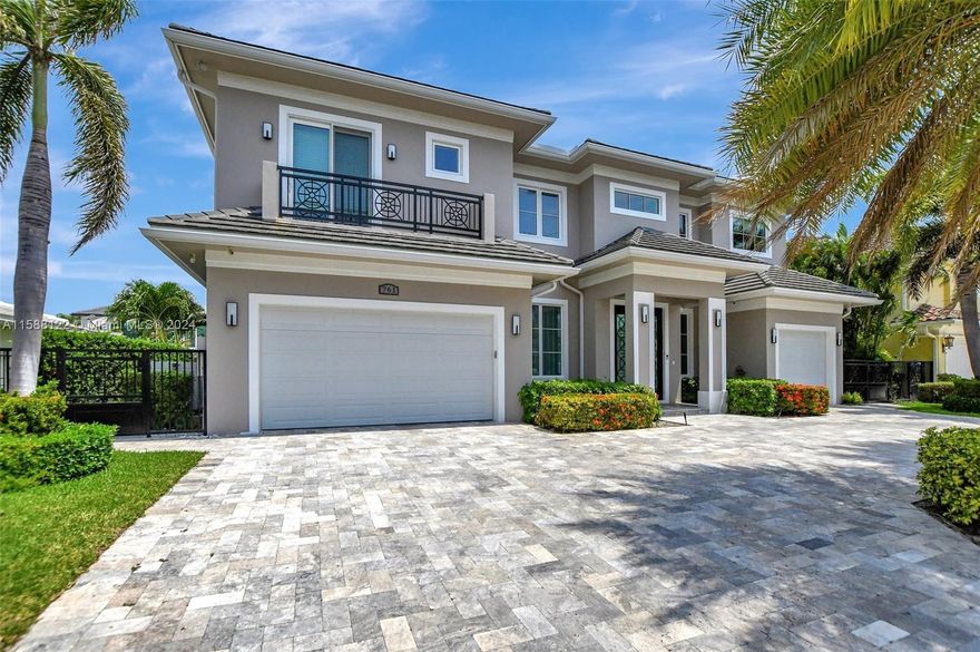 No Fixed Bridges and No Mandatory HOA, Deepwater East Boca Raton Custom Estate. Exemplifying the pinnacle of luxury waterfront living, this custom-built 2015 property in Blue Inlet combines meticulous craftsmanship with unparalleled sophistication. Featuring 4 bedrooms and 5 1/2 baths as well as a private office or library with en suite full bath. This home boasts high-quality materials and premium finishes throughout as well as a tiled 3 car garage. With easy ocean access and no fixed bridges, the property offers a coveted waterfront lifestyle. Highlights include a dock with a 14,000-pound boat lift, marble flooring, insulated impact windows, a bespoke temperature-controlled cellar room, and a PebbleTec saltwater pool.