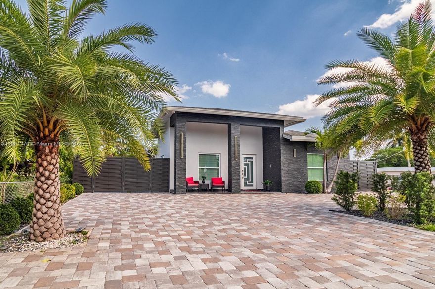WELCOME to this charming home ,crafted with care in 2022!. Boasting 3 bedrooms and 2 bathrooms , this residence offers comfort and style . Nestled on a spacious fenced lot, relish ample backyard space, complemented by a covered area for outdoor enjoyment . Inside discover brand new appliances in the well-appointed kitchen , and enjoy the convenience of a utility closet with a washer and dryer . WITH NO HOA , the property provides freedom and flexibility. Perfectly situated just minutes from I95,the airport, this home offers easy access to nearby beaches and THE PALM BEACH OUTLETS . Embrace a lifestyle of a contemporary convenience and coastal charm in this inviting abode!.