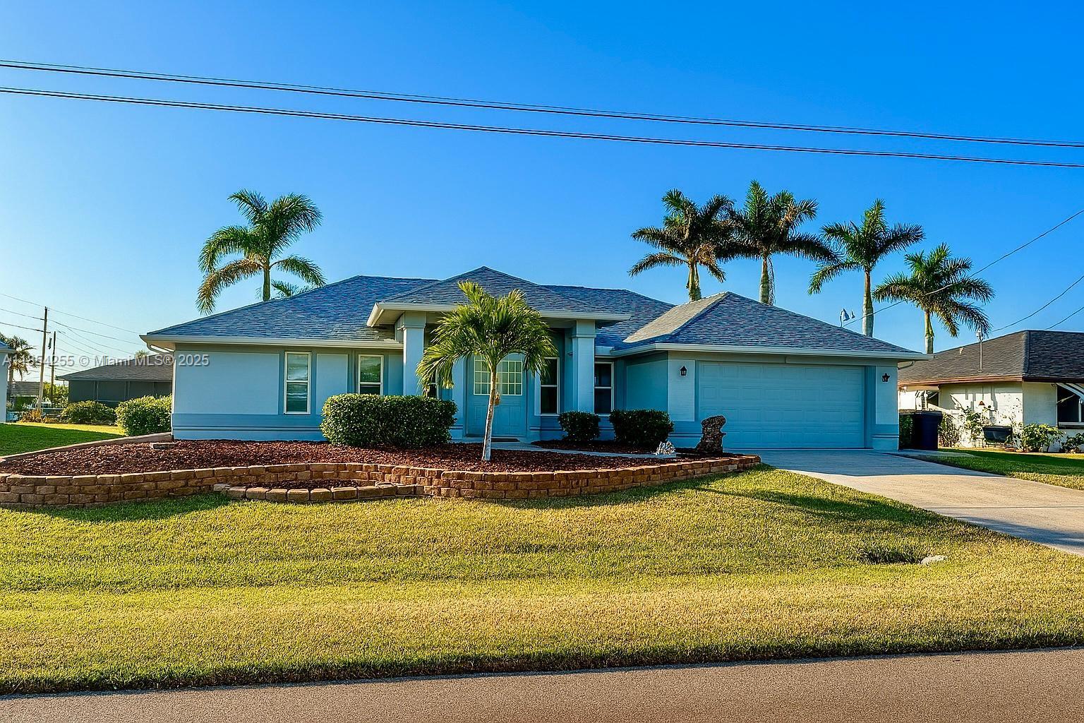 Direct Gulf Access – No Bridges! Stunning 3-bed, 2-bath Cape Coral waterfront home with hurricane-impact windows and doors, combining luxury, safety, and style. From the front door, take in a panoramic canal view through a large picture window. Minutes from Sanibel, Captiva, and Fort Myers Beach, this retreat features an open, light-filled floor plan, a sleek modern kitchen, and a spacious master suite with a quartz vanity and walk-in shower. Enjoy sunsets from the expansive screened lanai, entertain by the water, or launch your boat from the private dock for instant Gulf access. Surrounded by top restaurants, shops, and supermarkets, this home is perfect for year-round living or a vacation paradise