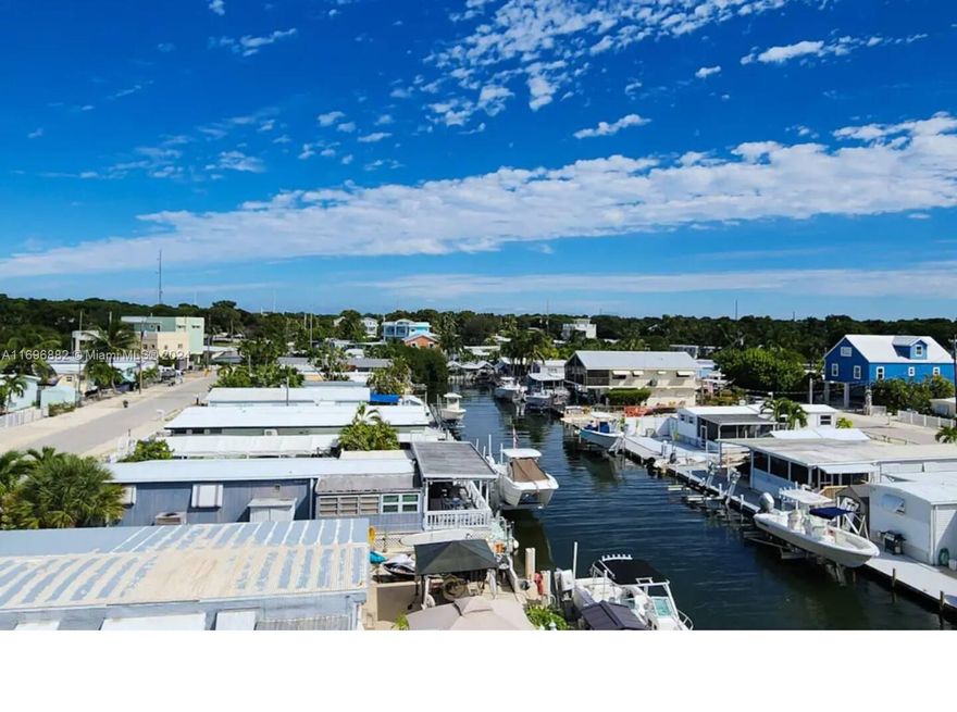 Sprawling waterfront home with private pool, dock, pool table, grill, & W/D. "Monthly Vacation Rental"
Experience Key Largo by booking “The Salt Life”! Nestled alongside the water, your vacation will be shrouded in sunshine and hugged by the sea breeze.
Located on Black Water Sound Bay, making it conveniently close to the best waterfront dining in Key Largo, whether it be by car or boat.
Spend your days in the heated pool, swaying in the relaxing hammock. 

 Elevator, Pool, and Roof Top
Deck perfect for Spectacular water views overlooking the sound. Sunset viewings nightly. This 4 Bedroom
4 Bathroom, 3 Story home