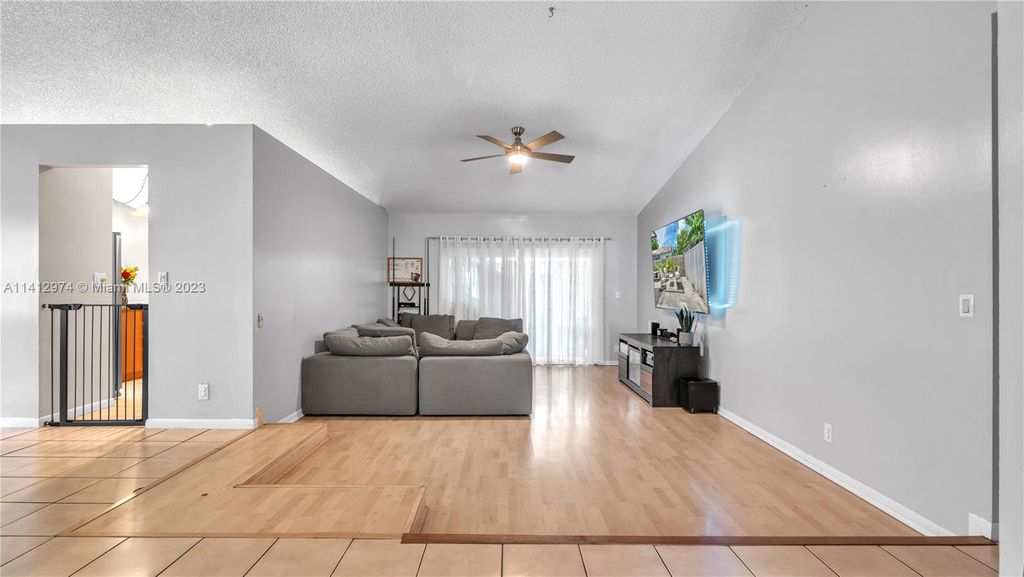 Photo of 8421 NW 34th Mnr, Sunrise, FL 33351 (MLS # A11412974)