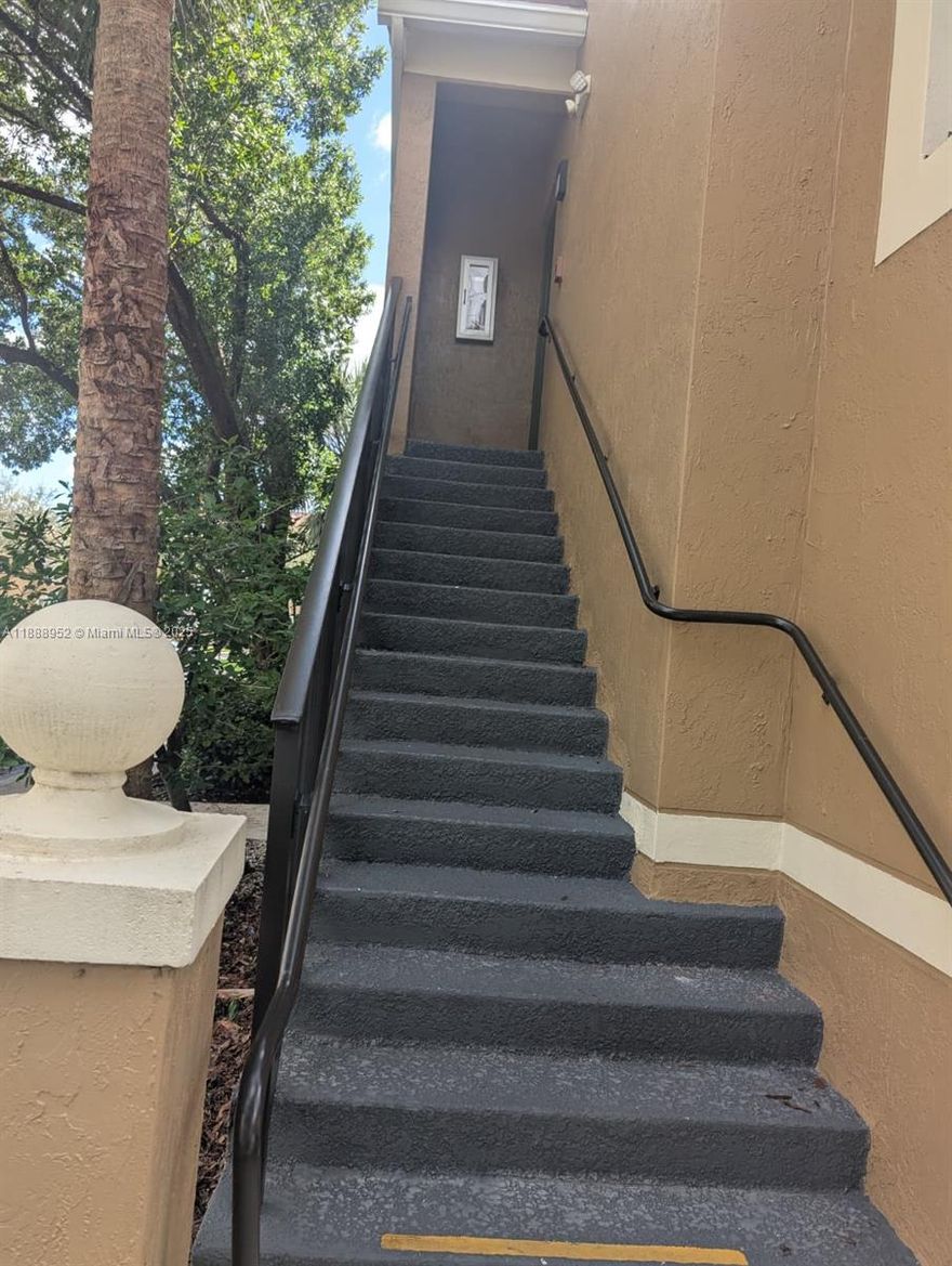 Don't miss this opportunity to live in a choice corner unit. Relax from the comfortable balcony, and enjoy the private entrance.  Freshly painted, immaculate, with even a washer and dryer inside the unit.  Amenities include a clubhouse, gym, community pool, and tennis courts, all within a gated community.
