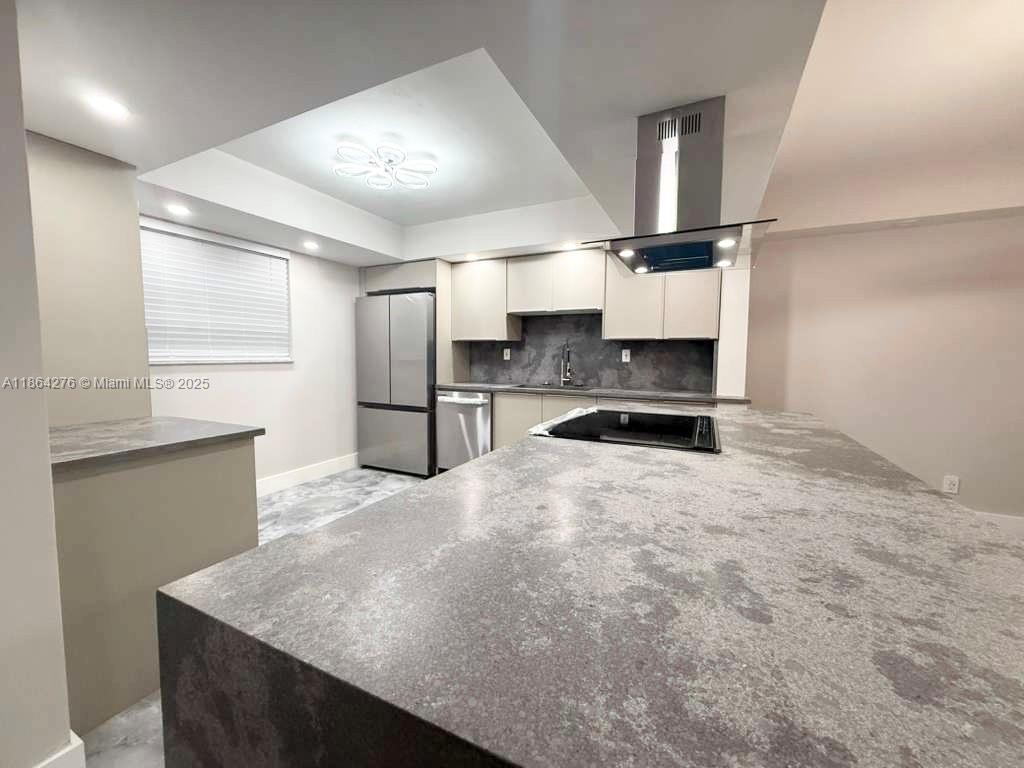 PERFECTION DOES EXIST! COME SEE THIS STUNNING HOME IN THE HEART OF TAMARAC. RETIRE IN TOP OF THE LINE STYLE. CUSTOM QUARTZ COUNTER TOPS WITH AN OPEN FLOOR PLAN AND COOKING ISLAND AWAIT ALL OF YOUR FABULOUS MEALS AND GATHERINGS. STAINLESS STEEL APPLIANCES HAVE A 2 YEAR WARRANTY. CUSTOM GORGEOUS TILE THROUGHOUT THIS FRSHLY REMODELED HOME WITH FROSTED GLASS DOORS AS YOU WALK INTO EVERY AMAZINGLY LIT ROOM. THERE IS A SPACIOUS DEDICATED LAUNDRY ROOM WITH PLENTY OF STORAGE. LETS NOT FORGET THE SPA BATHROOMS WITH MODERN TOUCHES SUCH AS COLORFUL FUN WATER TEMPERATURE INDICATION! IT ALSO HAS BEAUTIFUL LAKE VIEWS. EVERYTHING IN THIS HOME IS SMART (LIKE IT'S FUTURE OWNER) FROM THE KITCHEN APPLIANCES TO THE CAMERA AND LOCKS ON THE DOOR! THERE ARE SOME AWESOME AMENITIES AS WELL! CALL FOR AN APPOINTMENT