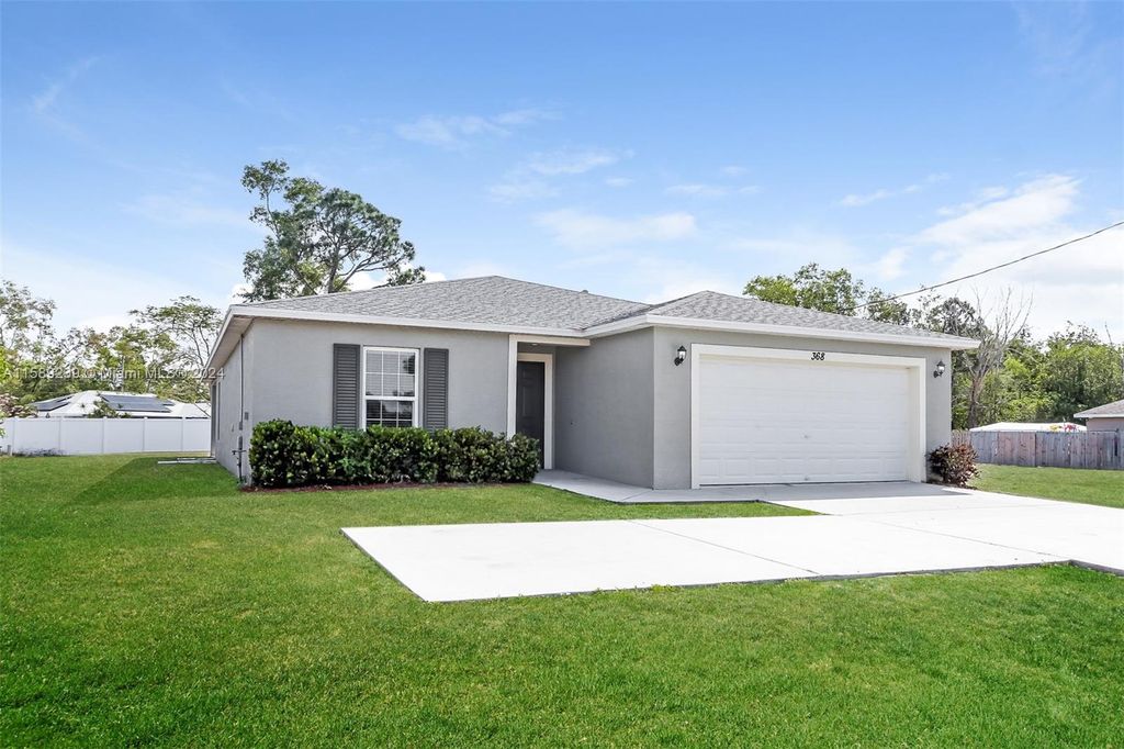 Photo of 368 SW Tulip Blvd, Port Saint Lucie, FL 34953 (MLS # A11589239)