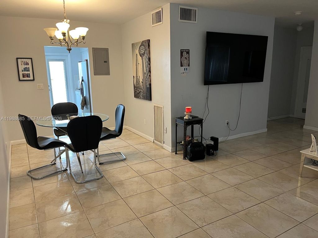 Photo of 462 Golden Isles Dr #203, Hallandale Beach, FL 33009 (MLS # A11988685)