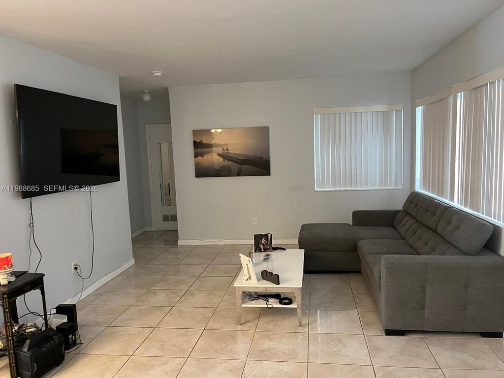 Photo of 462 Golden Isles Dr #203, Hallandale Beach, FL 33009 (MLS # A11988685)