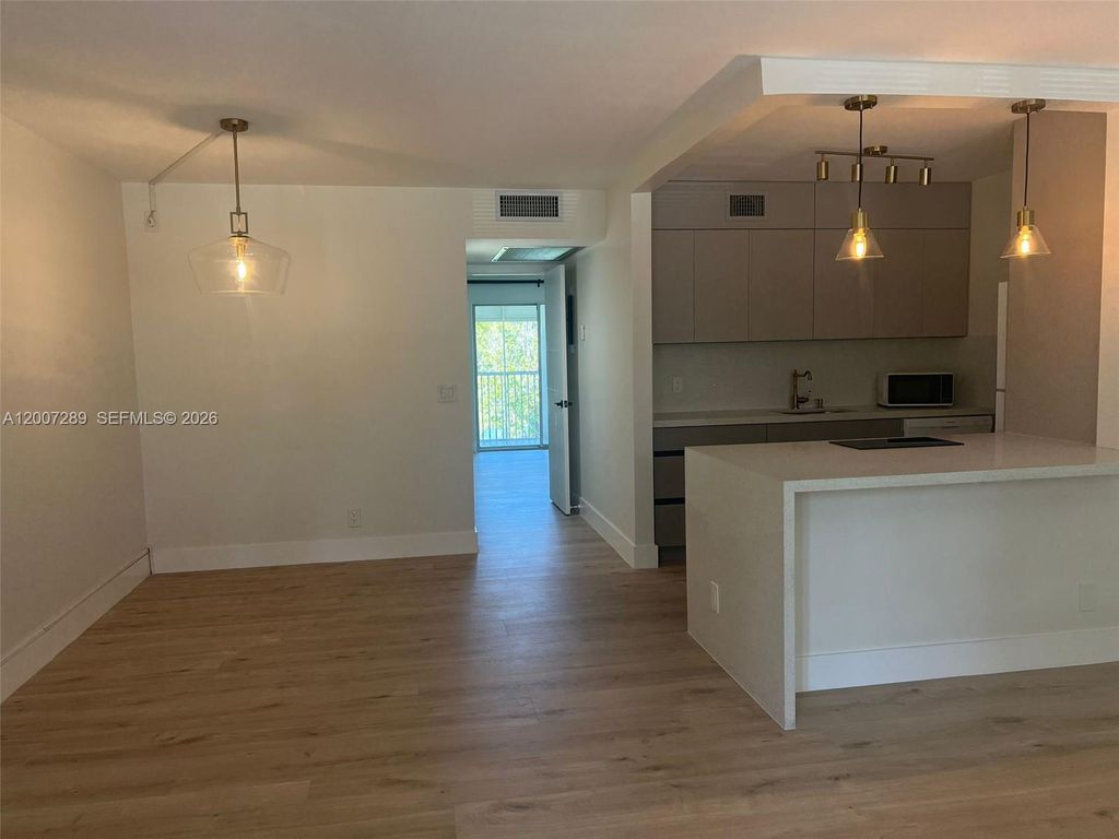 Photo of 13155 SW 7th Ct #204E, Pembroke Pines, FL 33027 (MLS # A12007289)