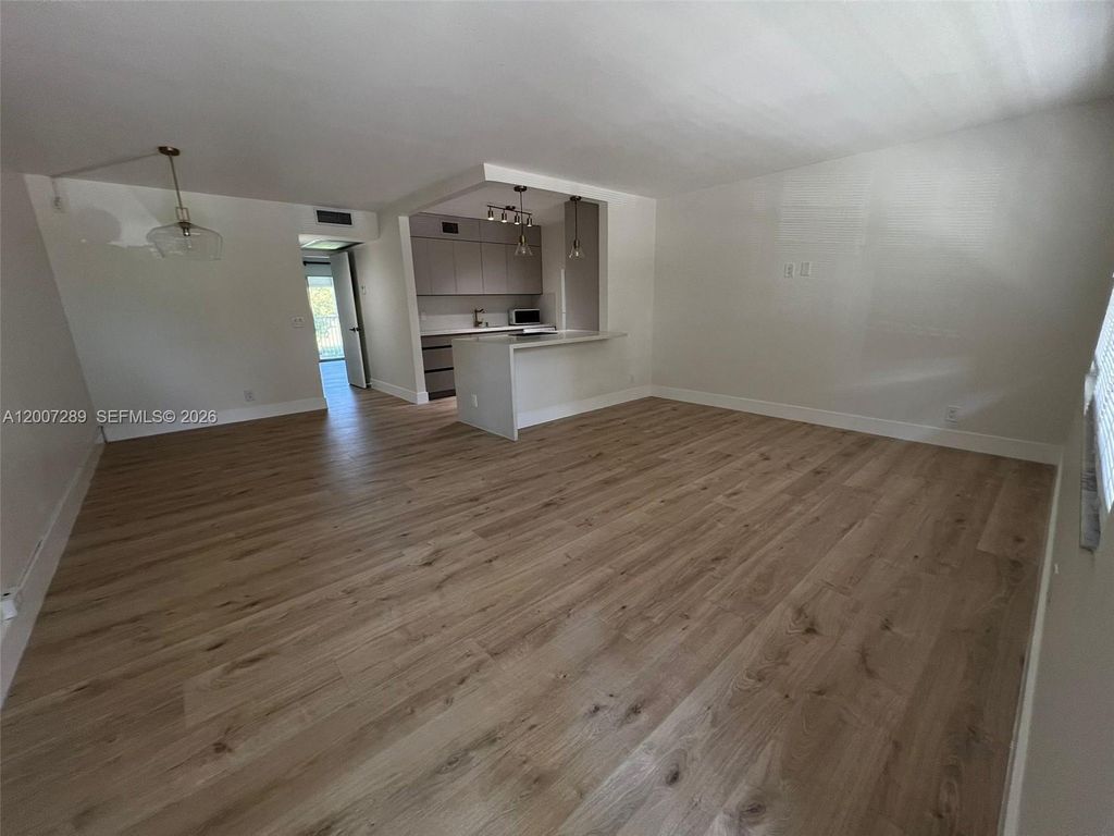 Photo of 13155 SW 7th Ct #204E, Pembroke Pines, FL 33027 (MLS # A12007289)