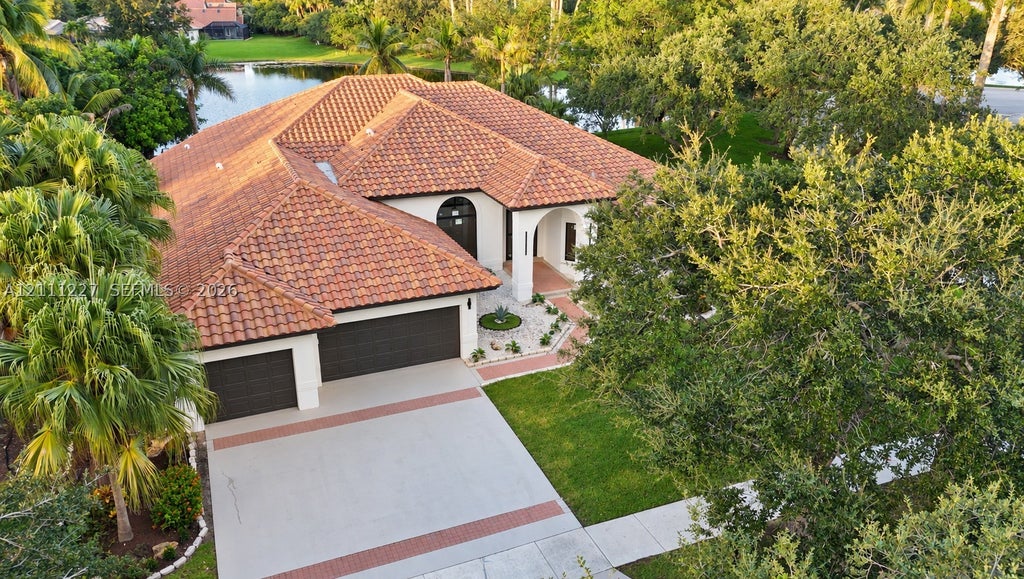 Photo of 1190 Manor Ct, Weston, FL 33326 (MLS # A12111227)