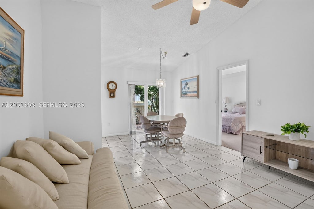 Photo of 14147 N Forest Oak Cir, Davie, FL 33325 (MLS # A12051398)
