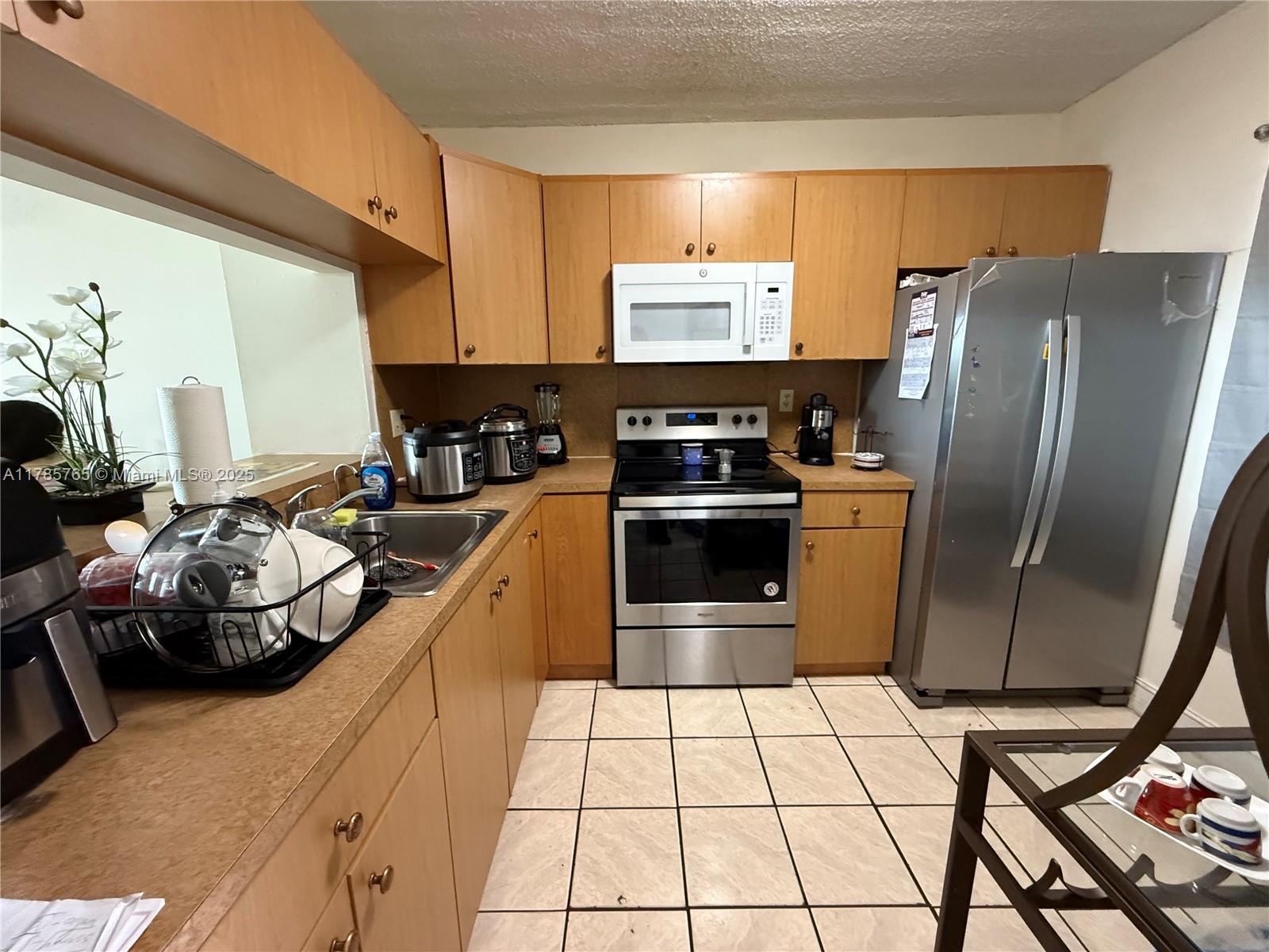 Property for Sale at 19805 Sw 114th Ave 315, Miami, Broward County, Florida - Bedrooms: 2 
Bathrooms: 2  - $174,900