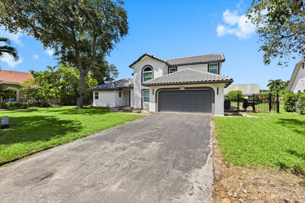 Photo of 4391 NW 51st St, Coconut Creek, FL 33073 (MLS # A11877242)