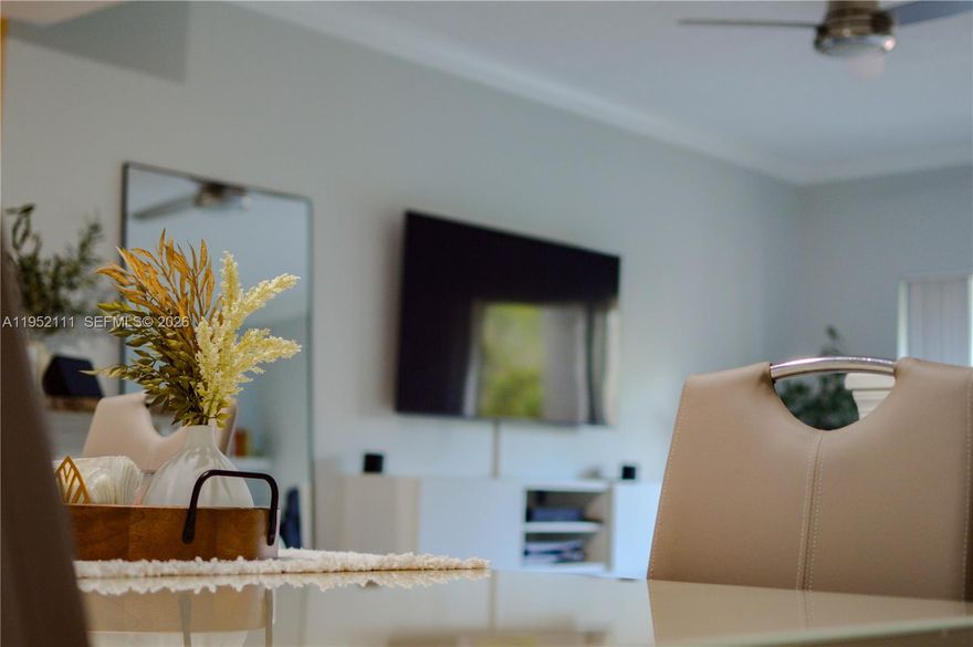 Investor-friendly community—ok to lease right away. Tenant-occupied by a great tenant. Gated community. This well-maintained 2-bedroom, 2-bath residence features wood-look tile flooring, crown molding, generous closet space, and an in-unit laundry room with a full-size washer and dryer. The community offers a clubhouse, fitness center, and pool, and is walkable to a nearby shopping center featuring Aldi, HomeGoods, Starbucks, and more. Centrally located with easy access to major highways and key roadways, making commuting and daily conveniences effortless.