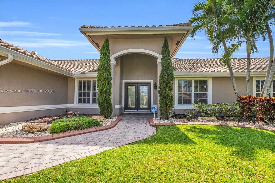 Welcome to this beautifully maintained lakefront home in the highly sought-after Chapel Trail community of Pembroke Pines! Situated on an oversized lot, this home offers the perfect blend of elegance, comfort, and resort-style outdoor living. The backyard is a true showstopper featuring a custom heated saltwater pool with full automation, color-changing LED lighting, and a luxurious 6-person hot tub/spa—perfect for entertaining or relaxing while enjoying peaceful lake views. Inside, you’ll find a bright and inviting layout enhanced by recessed lighting throughout, elegant crown molding, and smooth ceilings with no popcorn. The spacious interior offers comfortable living spaces ideal for both everyday living and hosting guests. Additional highlights include a 2-car garage, low HOA, and a prime location in one of West Pembroke Pines’ most desirable communities. Conveniently located near top-rated schools, parks, shopping, dining, and major commuter routes. A rare opportunity to own a move-in ready lakefront home with premium upgrades and a backyard oasis that truly stands out!
