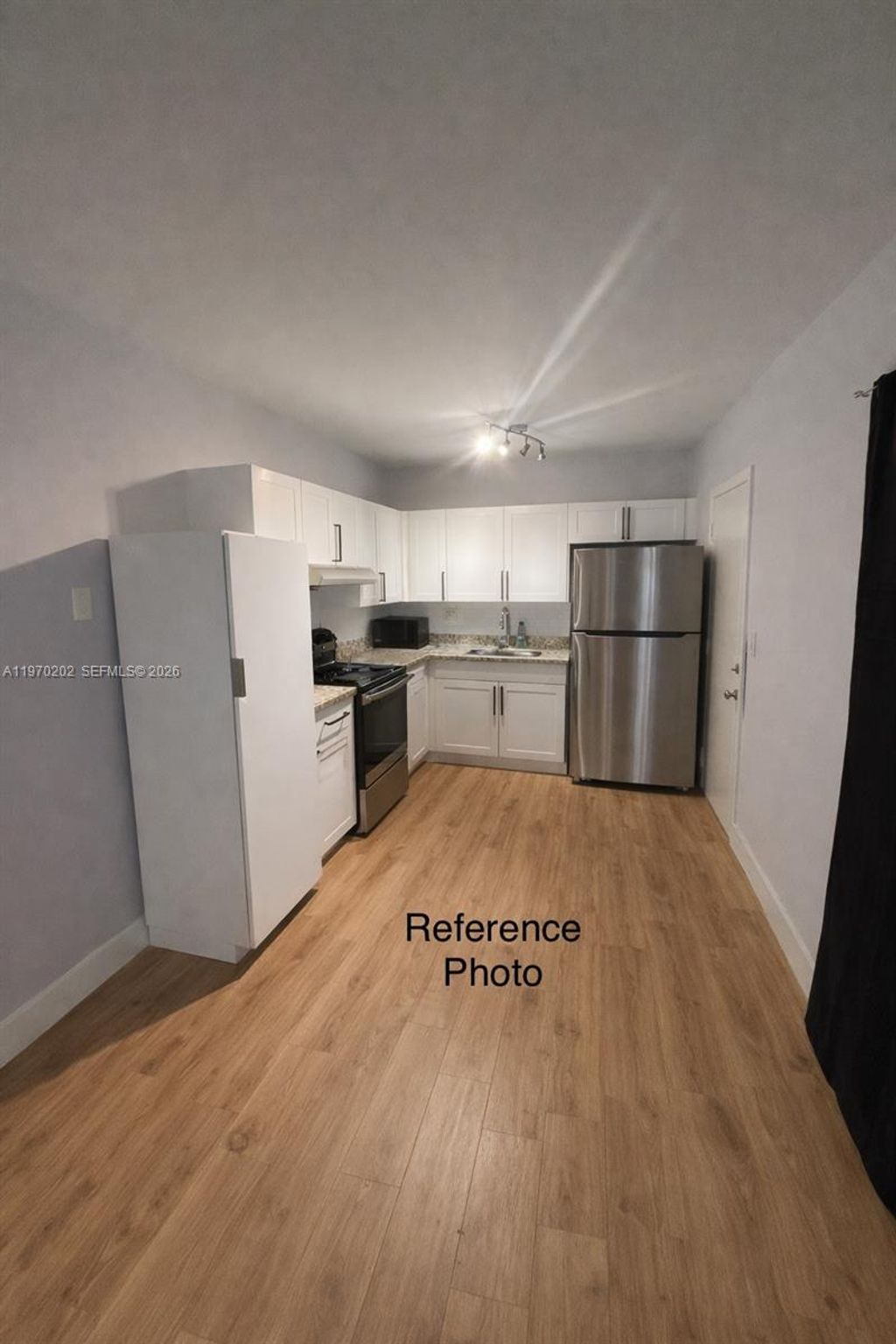 Photo of 1824 Monroe St #12, Hollywood, FL 33020 (MLS # A11970202)