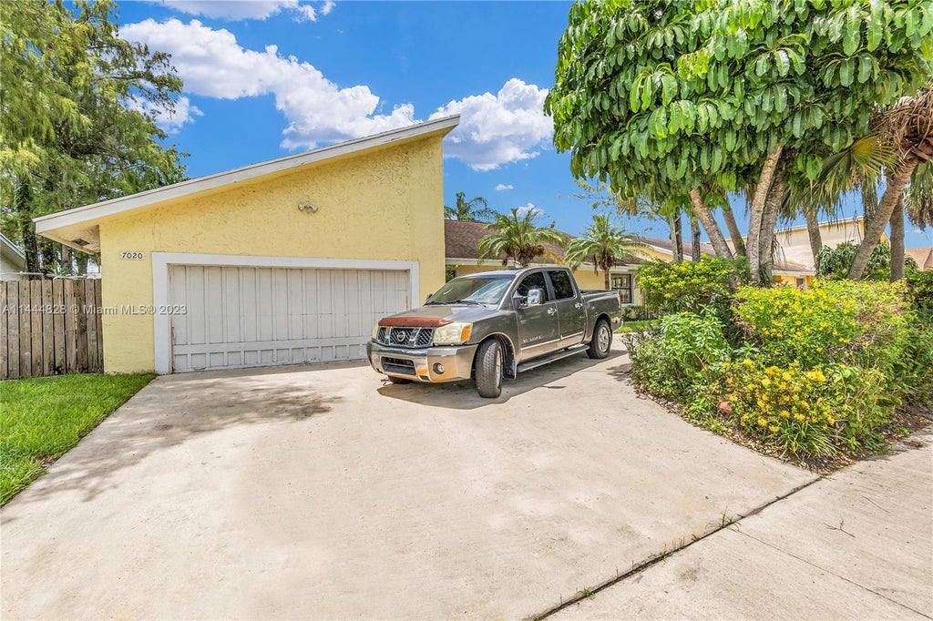 Photo of 7020 NW 49th Pl, Lauderhill, FL 33319 (MLS # A11444828)
