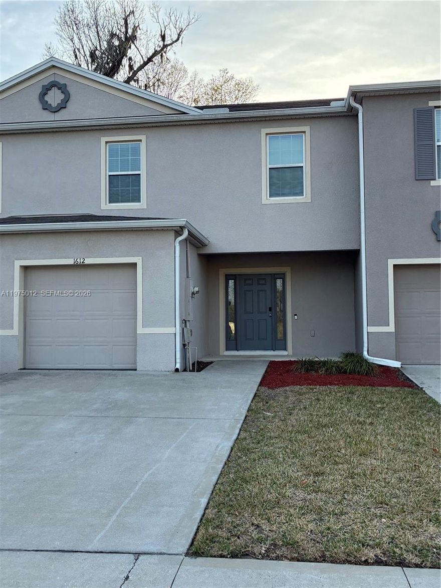 LOOK NO FURTHER! This Mirage Townhomes beauty just received a massive "glow-up" and is officially the best-looking move-in-ready opportunity in Holly Hill! Built just five years ago, this 3-bedroom, 2.5-bath gem has been completely refreshed with brand-new, plush designer carpeting and a crisp, modern paint palette that makes the entire home radiate with natural light. The spacious open-concept floor plan is a dream for entertaining, flowing effortlessly from the chef-ready kitchen into a bright living area that opens directly to your private, screened-in porch—the ultimate spot for bug-free relaxation and morning coffee in the Florida breeze. With a convenient attached garage for all your beach gear and a location that puts the Atlantic coastline and premium amenities just minutes from your front door, you’re getting all the perks of new construction without the wait or the price tag. From the pristine interior to the peace of mind that comes with a newer roof and HVAC, this home is a total standout that’s ready for you to move in and start making memories today. Exceptional value like this doesn't stay on the market for long, so schedule your private tour before it's gone!