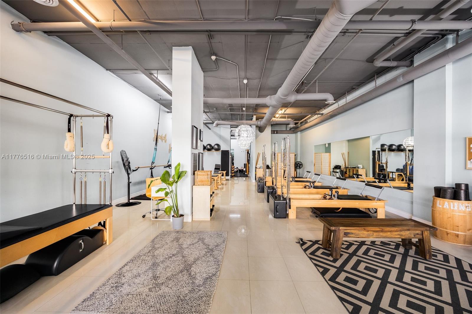Discover an exceptional opportunity in the heart of Coral Gables with this versatile 1,620 sf office condo. This 1st-floor, prime commercial space offers a wide range of uses, including office, retail, fitness, or light manufacturing—perfect for businesses seeking a highly visible and accessible location. Currently functioning as a pilates studio, the space is designed to accommodate various business types and includes a bathroom, ample storage, and open areas that can be tailored to suit your specific needs. Zoned as 7100 - Industrial Light Manufacturing and with a land use designation of 1118 Store: Condominium-Commercial, this unit is ideal for a variety of commercial operations. The current tenant's lease expires on August 31, 2025 offering immediate occupancy options.