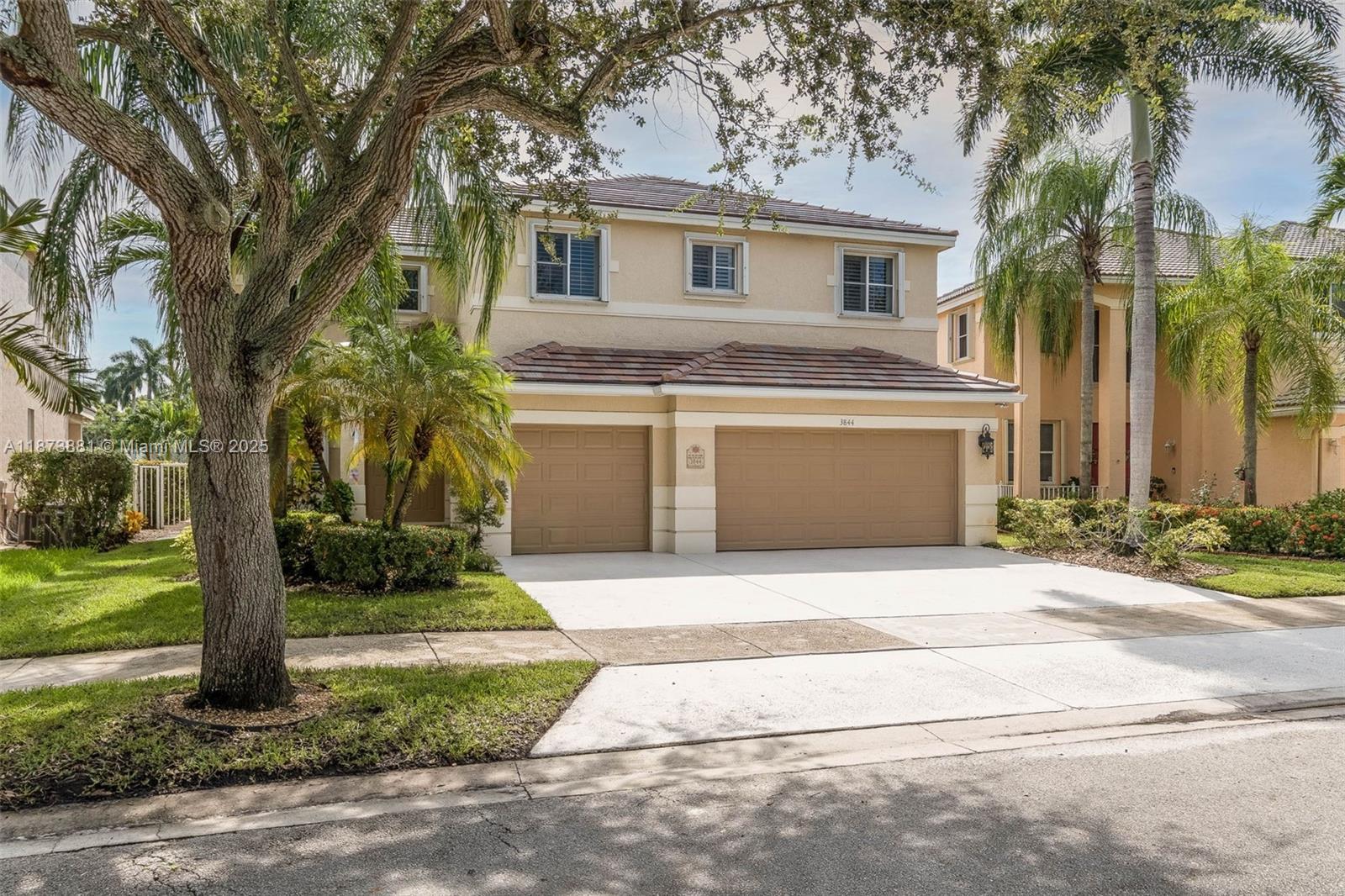 LAKEFRONT two-story home and POOL with new ROOF 2025 offering over 3300 square feet of living area. Located on a private waterfront in the community "The Ridges", walking distance from the schools. This home features 5 bedrooms with one full bedroom and bathroom downstairs, perfect for guests. Kitchen is updated with 42" cabinets, granite, and stainless steel appliances. New vinyl tiles * Hurricane Accordions* New AC in 2024* Pool resurfaced in 2024* and Plantation shutters in all windows and sliders.