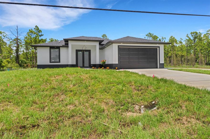 Welcome to your dream home! This brand-new construction is situated on a desirable corner lot just off Williams, placing you mere minutes from shopping, dining, and medical centers. The home offers 3 spacious bedrooms, 2 modern bathrooms, a 2-car garage with a sleek epoxy floor, and a fully equipped laundry room complete with a washer and dryer. Step inside to find stunning quartz countertops, elegant white porcelain tile flooring throughout, and modern black and gold fixtures that add a touch of sophistication. Each bathroom features fog-lit mirrors, while the master bathroom includes dual shower heads for a spa-like experience. Outside, the screened-in lanai provides a serene retreat with no back neighbors, perfect for enjoying your morning coffee in peace.