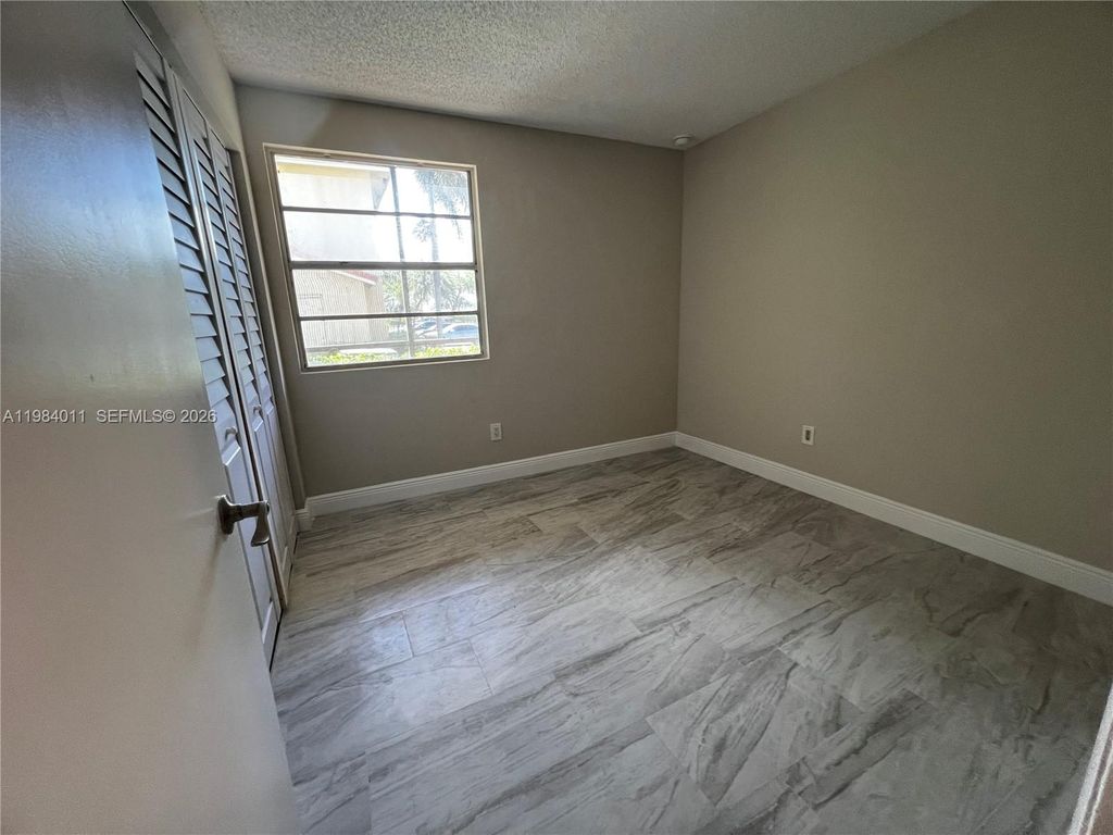 Photo of 1247 SW 46th Ave #1315, Pompano Beach, FL 33069 (MLS # A11984011)