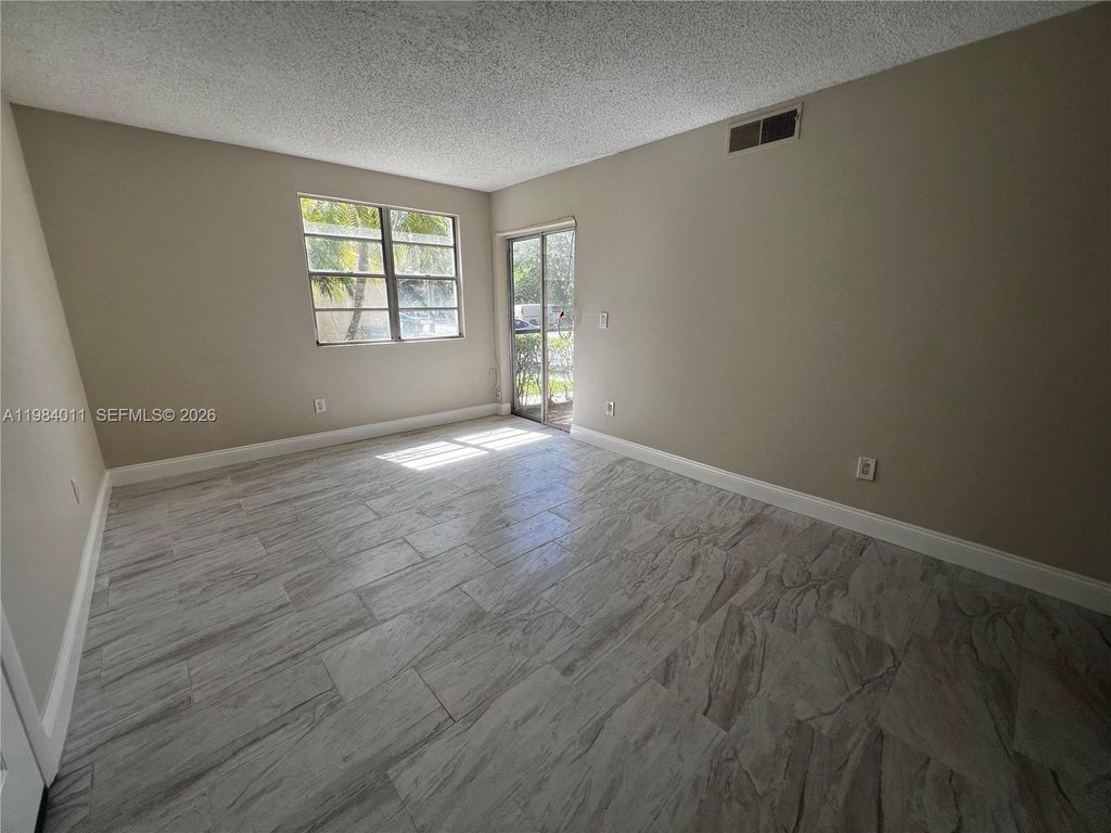 Photo of 1247 SW 46th Ave #1315, Pompano Beach, FL 33069 (MLS # A11984011)