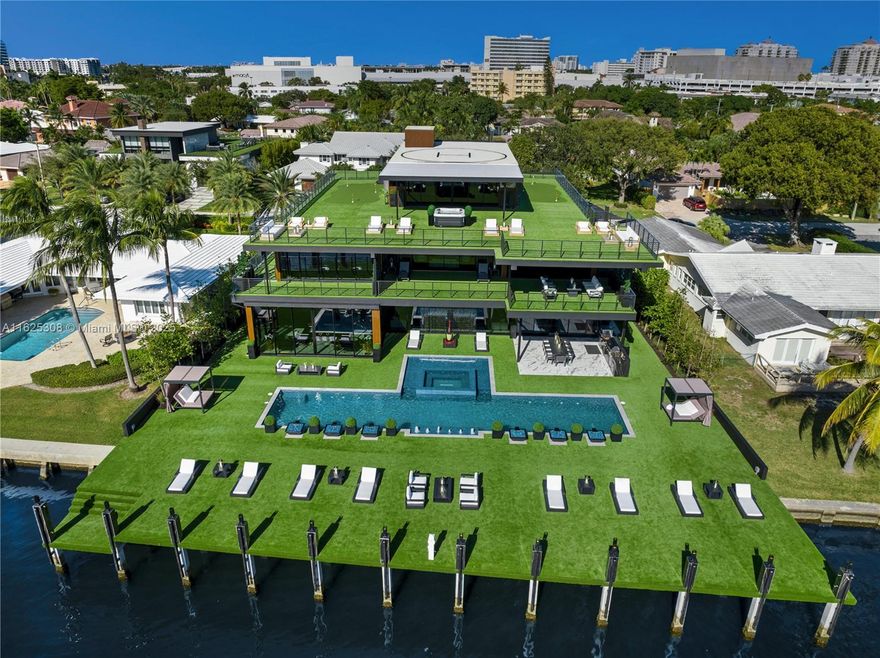 733 Middle River rests on one of Fort Lauderdale’s most enviable and wide channels, offering 108 feet of prime deep water-frontage for super yachts. This waterfront mansion is a category leader. The genius of Prestige Homes, whose leader has an unparalleled obsession and passion for design, taste, and quality can only be understood in person. Now, as you make your way through the deliberate and artfully curated floor plates, offering over 22,000 sq ft of indoor/outdoor living, you gain an overwhelming sense of completeness, of healing and joy. This nearly 12,000 sq ft under AC waterfront mansion over-delivers with 5 bedrooms, 11 baths, 12-seat theater, gym, salt sauna, office with car collector’s glass wall, miniature golf course, and Jetson drone landing pad. Property sold fully-furnished