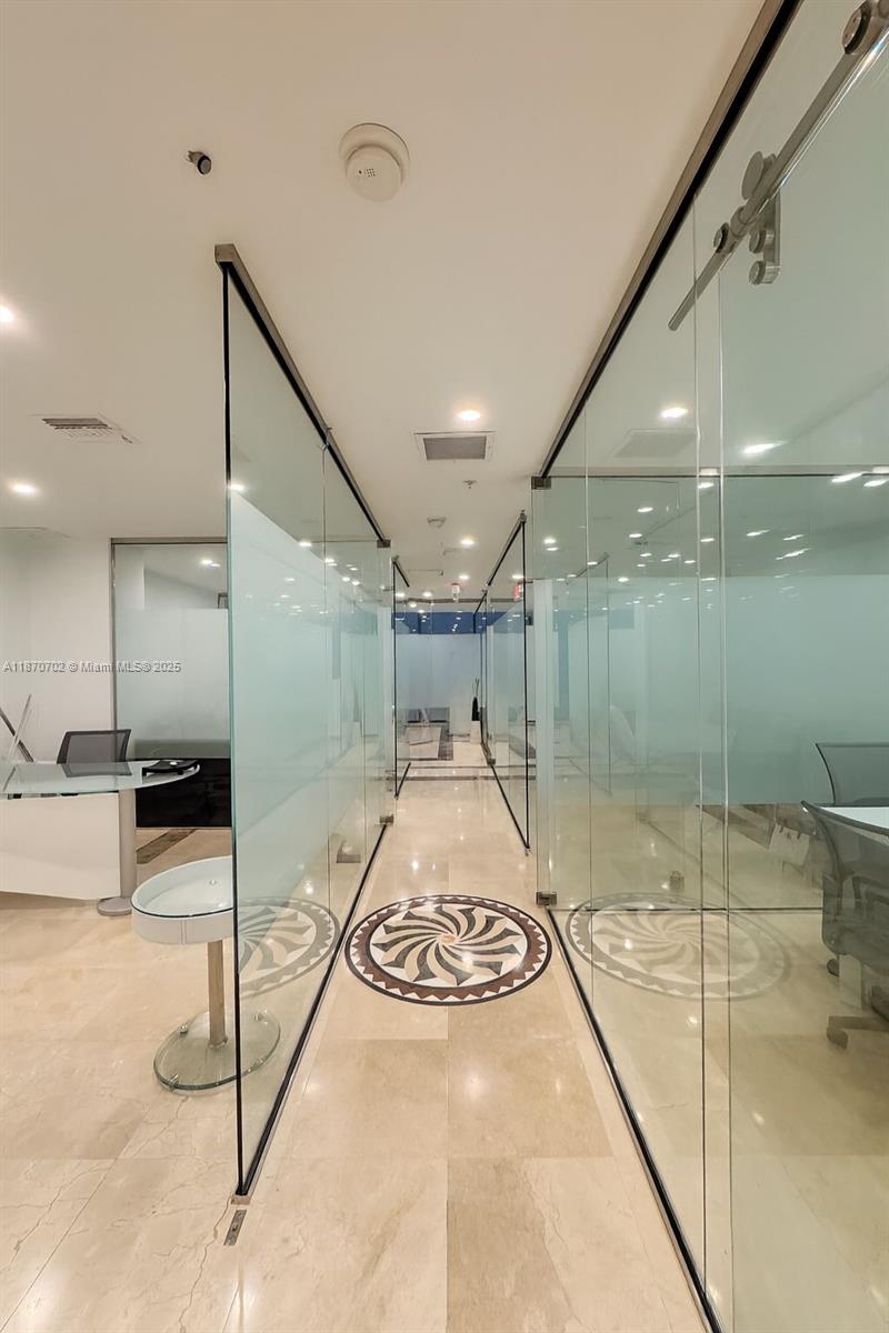 Discover a modern and elegant office space in the heart of Brickell at 1110 Brickell Ave, Units 607A & 607B. Featuring 5 private offices, a glass conference room, kitchen area fully equipped (coffee machine, microwave, mini-fridge, utensils), and modern furnishings, this workspace is truly move-in ready. Bright glass partitions, marble floors, and sleek design make it ideal for law firms, financial groups, or creative agencies. Offered fully furnished with parking included, this is the perfect opportunity to elevate your business presence in Miami’s premier financial district.